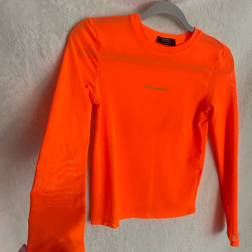 Size S orange shirt